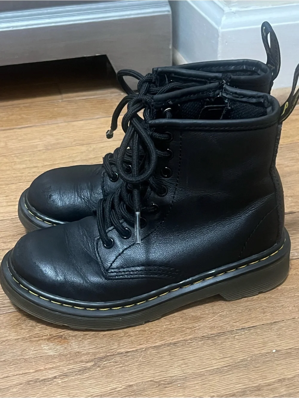 Dr. Martens Black Lace-Up kids Combat Boots with Yellow Stitching